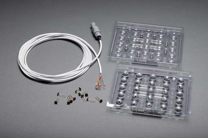 Hybrid Polaris® Tool Developer Kit including passive spheres, active markers, mounting posts and a cable assembly.